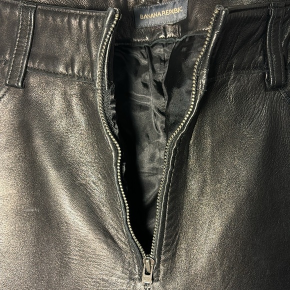 Banana Republic blk leather pants. Front zipper. Bttm left leg torn. 15" across - Picture 7 of 14